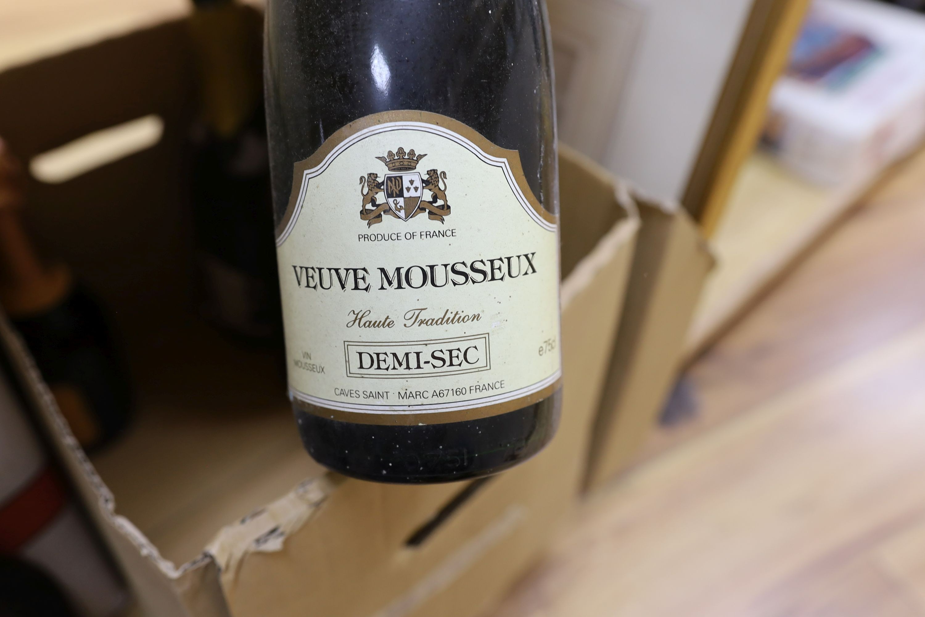 A group of wines and champagnes including Chateau La Coustere, Laurent-Perrier, L.Gardner and a bottle of Renault cognac